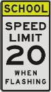 SCHOOL, SPEED LIMIT 20, WHEN FLASHING sign
